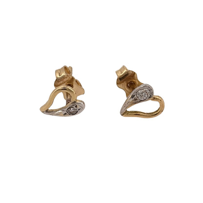 Add a charming piece to your jewellery collection with these pre-owned 18ct yellow and white gold cubic zirconia heart stud earrings, featuring a delicate two-tone gold design.

Design: The earrings feature a classic heart-shaped design, combining yellow and white gold with cubic zirconia detailing for an elegant and timeless appearance.
Material: Made from 18ct yellow and white gold, creating a beautiful contrast between the two gold tones.