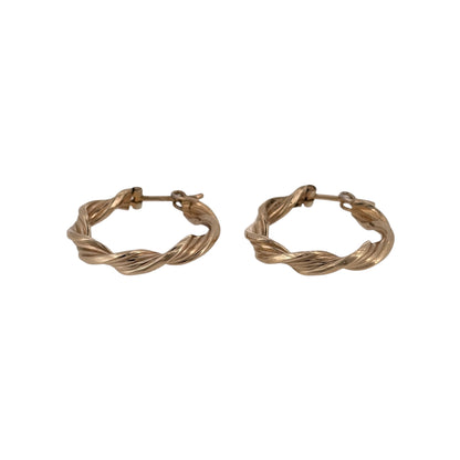 Add a classic piece to your jewellery collection with these pre-owned 9ct yellow gold twist hoop creole earrings, featuring a decorative twisted design and a timeless round shape.

Design: The earrings feature a traditional round creole design with twisted detailing, creating an elegant and distinctive appearance suitable for everyday wear.
Material: Made from 9ct yellow gold, offering a warm gold finish that complements the decorative twist design.