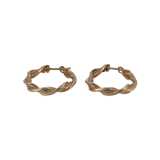 Add a classic piece to your jewellery collection with these pre-owned 9ct yellow gold twist hoop creole earrings, featuring a decorative twisted design and a timeless round shape.

Design: The earrings feature a traditional round creole design with twisted detailing, creating an elegant and distinctive appearance suitable for everyday wear.
Material: Made from 9ct yellow gold, offering a warm gold finish that complements the decorative twist design.