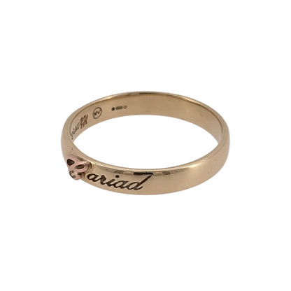 This pre-owned 9ct yellow and rose gold Clogau Cariad band ring is a timeless piece that beautifully showcases the elegance of Welsh gold.

Design: Featuring the iconic Clogau Cariad design, this elegant 3mm band combines polished 9-carat yellow gold with rare rose Welsh gold accents. Its simple yet meaningful style makes it perfect as an everyday ring or a thoughtful gift, symbolising love and Welsh heritage.
Material: Made from 9-carat yellow gold with rose Welsh gold detailing.