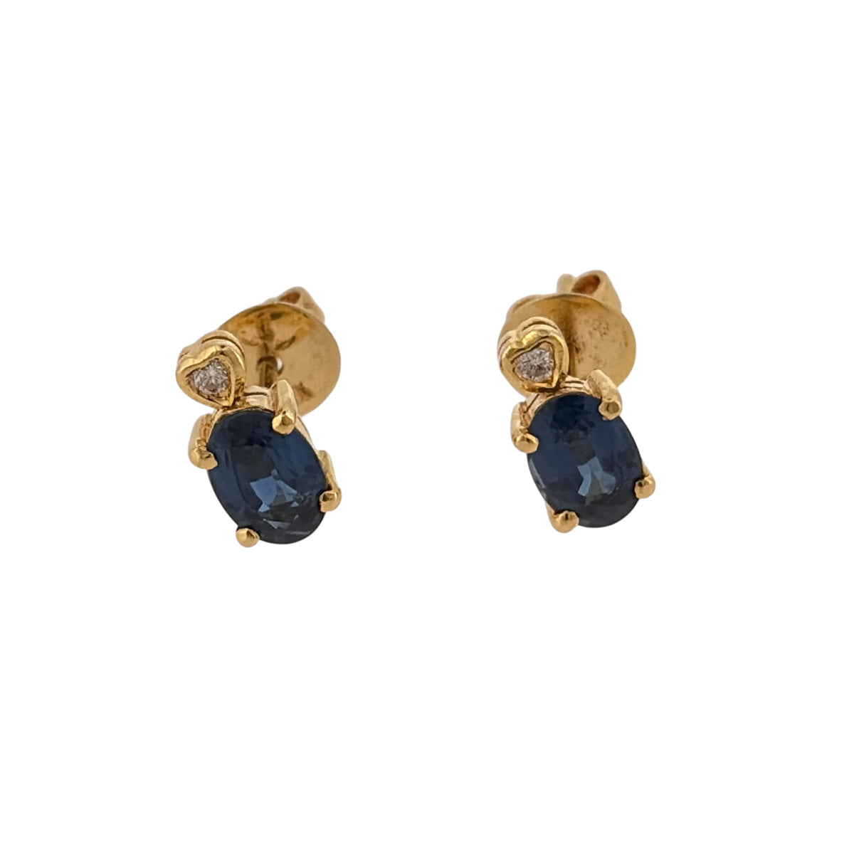 Add a classic piece to your jewellery collection with these pre-owned 18ct yellow gold diamond and sapphire stud earrings, featuring beautiful oval sapphires complemented by diamond detailing.

Design: The earrings feature an elegant oval sapphire design with diamond accents, creating a timeless appearance suitable for everyday wear or special occasions.
Material: Made from 18ct yellow gold, offering a warm gold finish that complements the sapphires and diamonds.