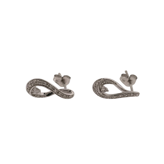 Add an elegant piece to your jewellery collection with these pre-owned 9ct white gold and diamond swirl stud earrings, featuring a decorative curved design with diamond detailing.

Design: The earrings feature a flowing swirl design, with curved lines creating a distinctive and elegant appearance suitable for everyday wear or special occasions.
Material: Made from 9ct white gold, offering a bright white finish that complements the diamonds.
