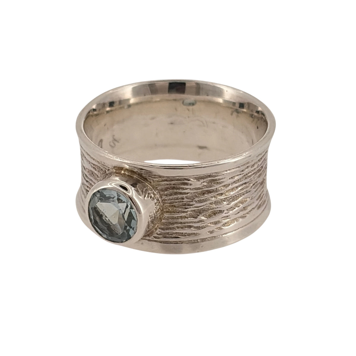Add a bold and colourful piece to your jewellery collection with this pre-owned 925 sterling silver and blue stone wide band ring, featuring a round blue stone set within a substantial silver band.

Design: The ring features a wide band design with a central blue stone, creating a distinctive and contemporary appearance.
Material: Made from 925 sterling silver, offering a bright silver finish that complements the blue stone.