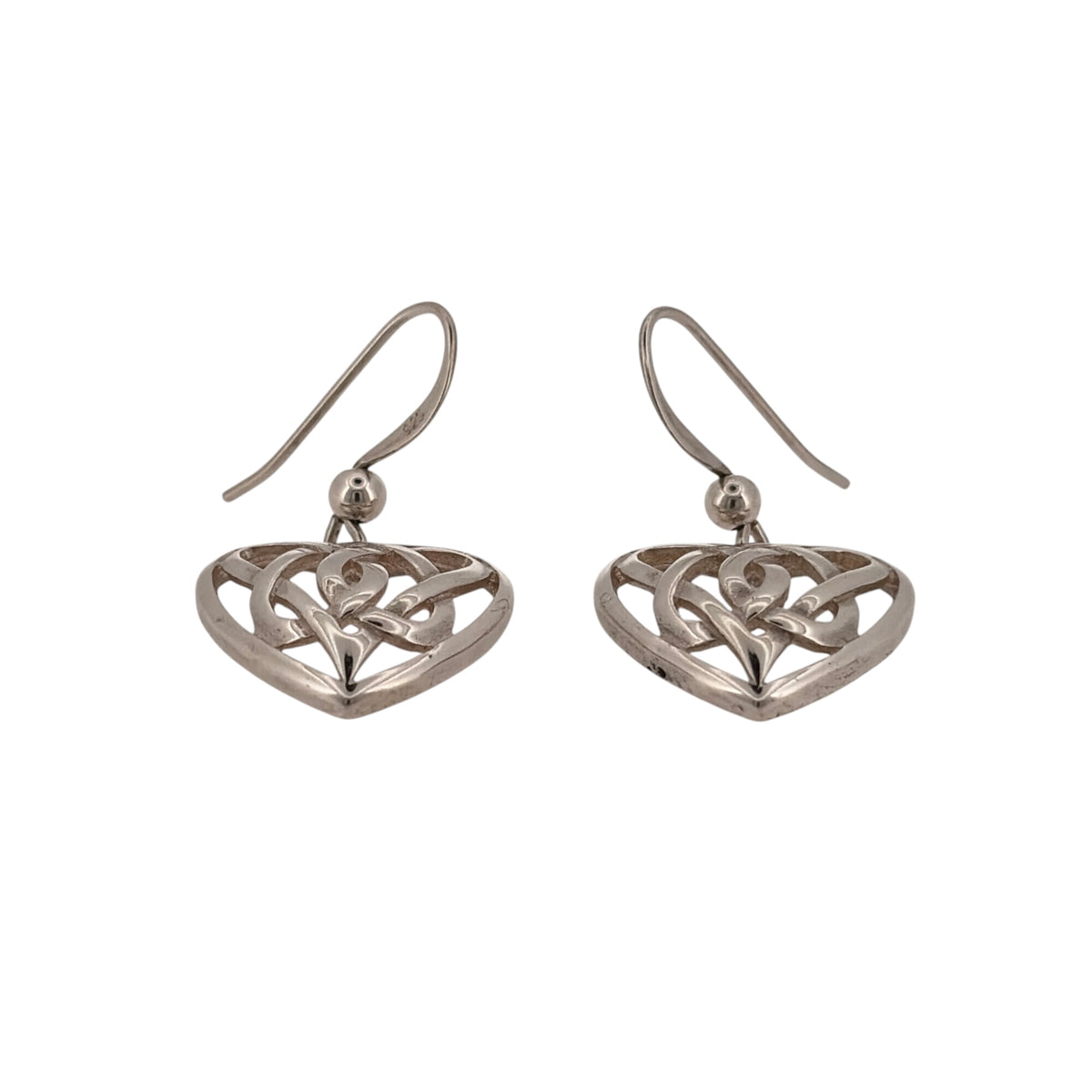 Add a meaningful touch to your jewellery collection with these pre-owned 925 sterling silver Celtic heart drop earrings, featuring a decorative heart design with traditional Celtic detailing.

Design: The earrings feature a Celtic-inspired heart design, combining traditional knotwork styling with a classic heart shape for an elegant appearance.
Material: Made from 925 sterling silver, offering a bright silver finish that complements the decorative detailing.