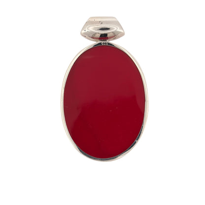 Make a statement with this pre-owned 925 sterling silver and red stone large oval pendant, featuring a bold oval red stone set within a classic silver design.

Design: The pendant features a large oval design, with a striking red stone creating an eye-catching and distinctive appearance.
Material: Made from 925 sterling silver, offering a classic silver finish that complements the rich red colour of the stone.