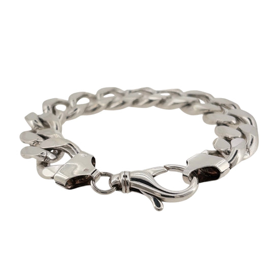 Make a statement with this pre-owned solid 925 sterling silver curb bracelet, featuring a chunky link design and an impressive weight of 97 grams.

Design: The bracelet features a classic curb link design, with substantial interlocking links creating a bold and timeless appearance.
Material: Made from solid 925 sterling silver, offering a classic silver finish.
Bracelet Detail: The curb links measure approximately 16mm wide, giving the bracelet a chunky and substantial appearance on the wrist.