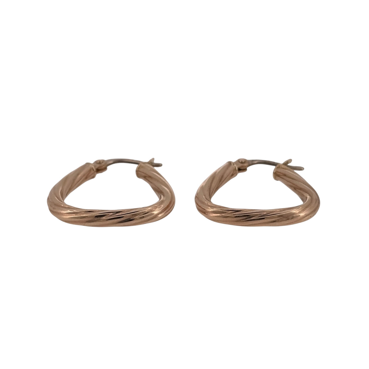 Add a stylish touch to your jewellery collection with these pre-owned 9ct yellow gold twisted triangle creole earrings, featuring a distinctive geometric design with elegant twisted detailing.

Design: The earrings feature a triangular creole design with twisted detailing, creating a modern twist on a classic gold earring style.
Material: Made from 9ct yellow gold, offering a classic warm gold finish.