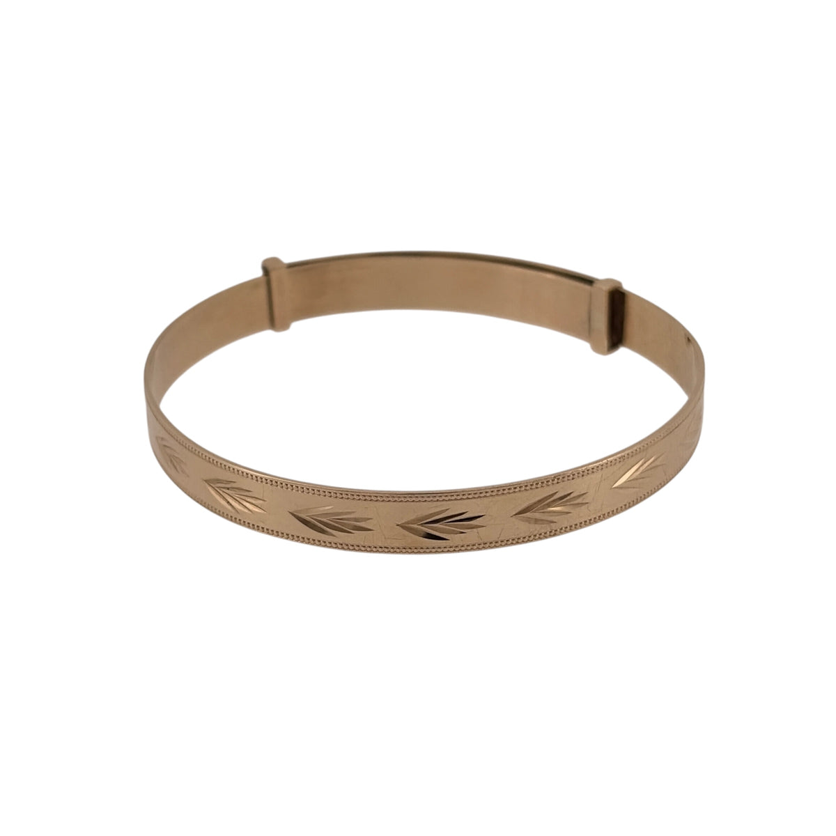 Celebrate a special occasion with this pre-owned 9ct yellow gold patterned expanding baby bangle, featuring a traditional design with decorative detailing.

Design: The bangle features a classic expanding design with patterned detailing, creating a timeless and attractive appearance.
Material: Made from 9ct yellow gold, offering a traditional warm gold finish.
Bangle Detail: The bangle measures approximately 5mm wide and features an expanding design, allowing the diameter to be adjusted.