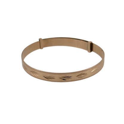 Celebrate a special occasion with this pre-owned 9ct yellow gold patterned expanding baby bangle, featuring a traditional design with decorative detailing.

Design: The bangle features a classic expanding design with patterned detailing, creating a timeless and attractive appearance.
Material: Made from 9ct yellow gold, offering a traditional warm gold finish.
Bangle Detail: The bangle measures approximately 5mm wide and features an expanding design, allowing the diameter to be adjusted.