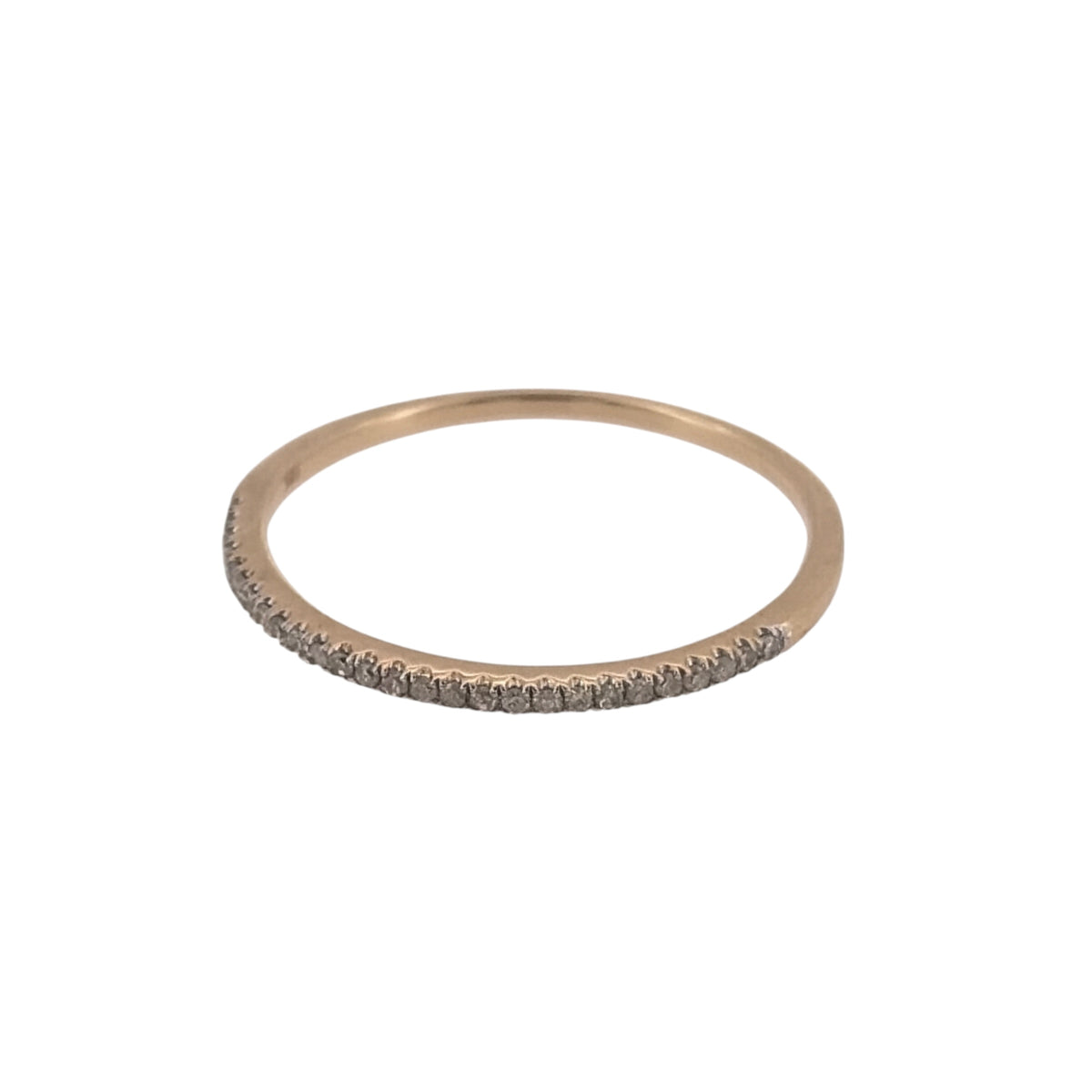 Add a delicate touch to your jewellery collection with this pre-owned 10ct yellow gold and diamond band ring, featuring a dainty design with small brilliant cut diamonds set across half of the band.

Design: The ring features a slim and elegant band design, with delicate diamond detailing creating a subtle and timeless appearance.
Material: Made from 10ct yellow gold, offering a classic warm gold finish.