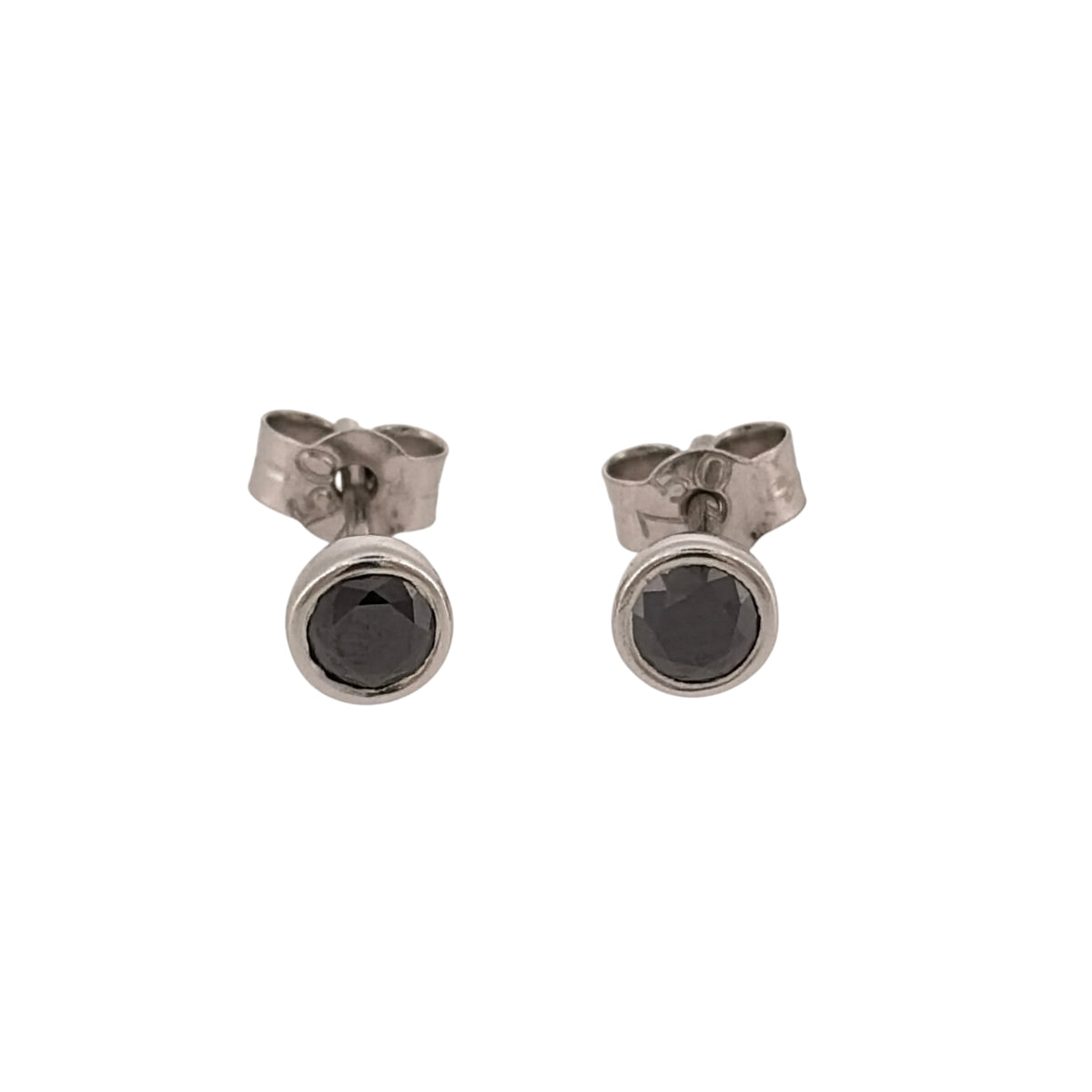 Add a sophisticated touch to your jewellery collection with these pre-owned 18ct white gold and black diamond stud earrings, featuring striking brilliant cut black diamonds in a classic stud design.

Design: The earrings feature a timeless solitaire stud design, with black diamonds creating a bold and elegant contrast against the white gold.
Material: Made from 18ct white gold, offering a classic white gold finish.