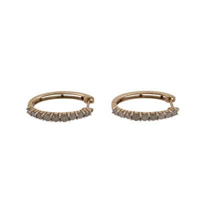 Add an elegant touch to your jewellery collection with these pre-owned 9ct yellow gold and diamond oval creole earrings, featuring a classic oval design with beautiful diamond detailing.

Design: The earrings feature a timeless oval creole design, with diamonds adding an attractive and sophisticated finish.
Material: Made from 9ct yellow gold, offering a traditional warm gold finish.