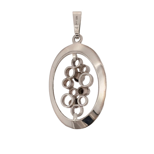 Add a distinctive piece to your jewellery collection with this pre-owned 925 sterling silver oval bubble style pendant, featuring a decorative bubble-inspired design and a classic silver finish.

Design: The pendant features an oval shape with bubble-style detailing, creating a contemporary and eye-catching appearance.
Material: Made from 925 sterling silver, offering a timeless silver finish that complements the decorative design.