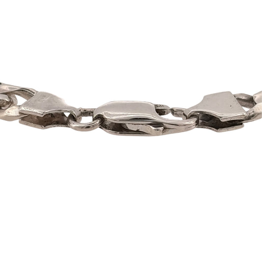 Add a classic piece to your jewellery collection with this pre-owned 925 sterling silver curb bracelet, featuring a traditional link design and a substantial silver finish.

Design: The bracelet features a classic curb link design, with interlocking links creating a timeless and versatile appearance suitable for everyday wear.
Material: Made from 925 sterling silver, offering a traditional silver finish.