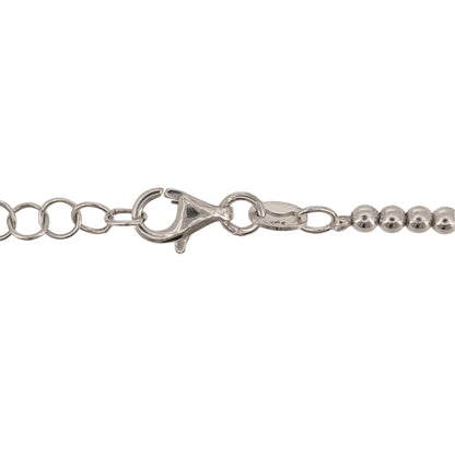 Add a versatile piece to your jewellery collection with this pre-owned 925 sterling silver adjustable ball link chain, featuring a classic design and an adjustable length for comfortable everyday wear.

Design: The chain features a decorative ball link design, creating a simple yet stylish appearance suitable for wearing alone or with a pendant.
Material: Made from 925 sterling silver, offering a timeless silver finish.
