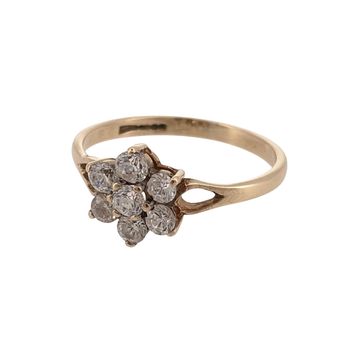 Add a pretty floral touch to your jewellery collection with this pre-owned 9ct yellow gold and cubic zirconia flower cluster ring, featuring a decorative arrangement of sparkling stones.

Design: The ring features a classic flower cluster design, with round cubic zirconia stones arranged to create an attractive floral appearance.
Material: Made from 9ct yellow gold, offering a traditional warm gold finish.