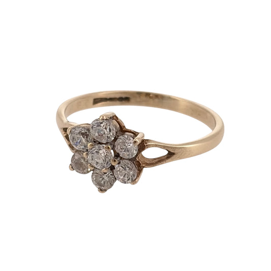 Add a pretty floral touch to your jewellery collection with this pre-owned 9ct yellow gold and cubic zirconia flower cluster ring, featuring a decorative arrangement of sparkling stones.

Design: The ring features a classic flower cluster design, with round cubic zirconia stones arranged to create an attractive floral appearance.
Material: Made from 9ct yellow gold, offering a traditional warm gold finish.