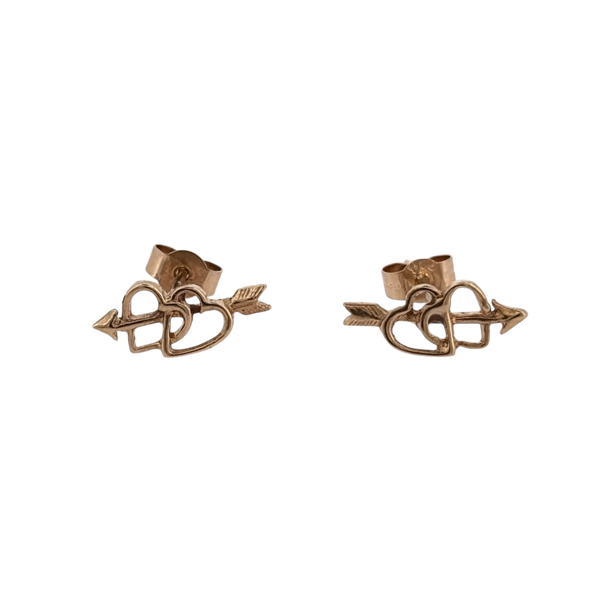 Add a charming touch to your jewellery collection with these pre-owned 9ct gold double arrow through heart stud earrings, featuring a delicate and meaningful design.

Design: The earrings feature a heart motif with two arrows passing through it, creating a romantic and decorative appearance.
Material: Made from 9ct gold, offering a classic gold finish.
Earring Detail: The face of each stud measures approximately 12mm by 5mm, creating a delicate yet distinctive appearance when worn.