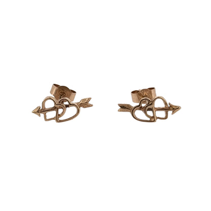 Add a charming touch to your jewellery collection with these pre-owned 9ct gold double arrow through heart stud earrings, featuring a delicate and meaningful design.

Design: The earrings feature a heart motif with two arrows passing through it, creating a romantic and decorative appearance.
Material: Made from 9ct gold, offering a classic gold finish.
Earring Detail: The face of each stud measures approximately 12mm by 5mm, creating a delicate yet distinctive appearance when worn.
