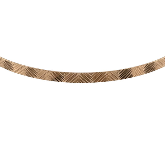 Add a timeless piece to your jewellery collection with this pre-owned 9ct yellow solid gold patterned bangle, featuring decorative detailing and a classic gold finish.

Design: The bangle features a traditional patterned design, creating an elegant and versatile appearance suitable for everyday wear.
Material: Made from solid 9ct yellow gold, offering a warm gold finish.