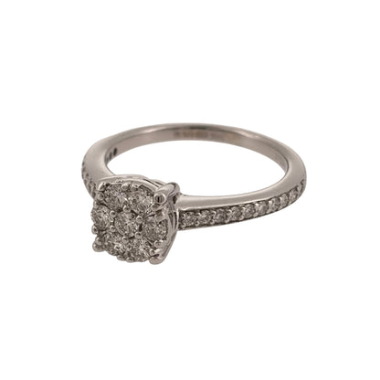 Add an elegant piece to your jewellery collection with this pre-owned 9ct white gold and diamond cluster ring, featuring a beautiful round diamond cluster with additional diamonds set along the shoulders.

Design: The ring features a classic round cluster design, with diamonds arranged across the centre and extending onto the shoulders for an attractive and timeless appearance.
Material: Made from 9ct white gold, offering a bright white gold finish that complements the diamonds.