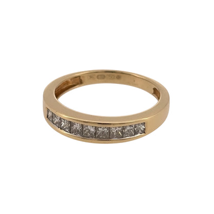 Add a timeless piece to your jewellery collection with this pre-owned 18ct yellow gold and diamond band ring, featuring beautiful diamond detailing and a classic gold finish.

Design: The ring features a traditional diamond band design, with diamonds set across the front to create an elegant and versatile appearance.
Material: Made from 18ct yellow gold, offering a classic warm gold finish.
