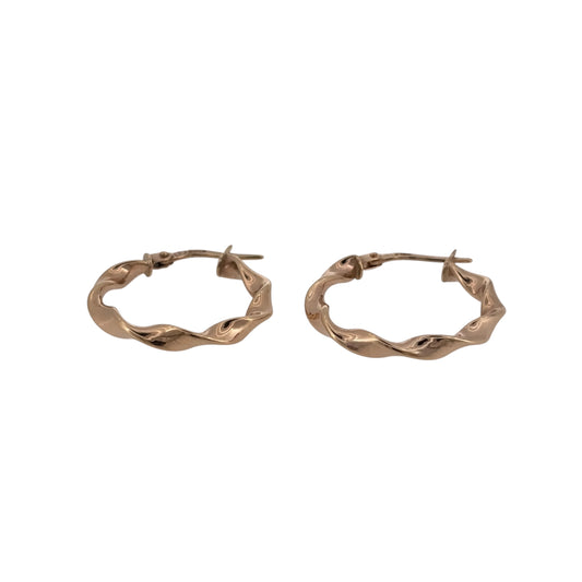 Add a classic touch to your jewellery collection with these pre-owned 9ct yellow gold twisted hoop creole earrings, featuring a decorative twisted design and a timeless gold finish.

Design: The earrings feature a traditional round creole hoop design with twisted detailing, creating an elegant and attractive appearance.
Material: Made from 9ct yellow gold, offering a classic warm gold finish.
