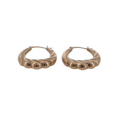 Add a classic touch to your jewellery collection with these pre-owned 9ct yellow gold twisted oval creole earrings, featuring an elegant oval shape with decorative twisted detailing.

Design: The earrings feature a traditional oval creole design with a twisted pattern, creating an attractive and timeless appearance.
Material: Made from 9ct yellow gold, offering a classic warm gold finish.