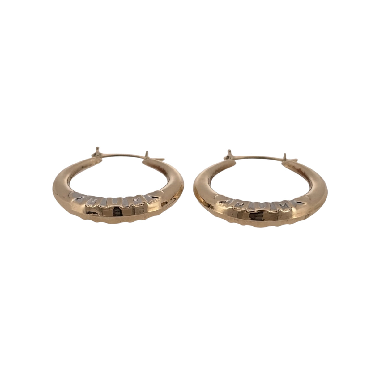 Add a meaningful touch to your jewellery collection with these pre-owned 9ct yellow and white gold Mum hoop creole earrings, featuring a decorative two-tone design with the word 'Mum' incorporated into each hoop.

Design: The earrings feature a classic round creole hoop design with 'Mum' lettering, combining yellow and white gold for an attractive two-tone appearance.
Material: Made from 9ct yellow and white gold, offering a combination of warm and contrasting gold tones.