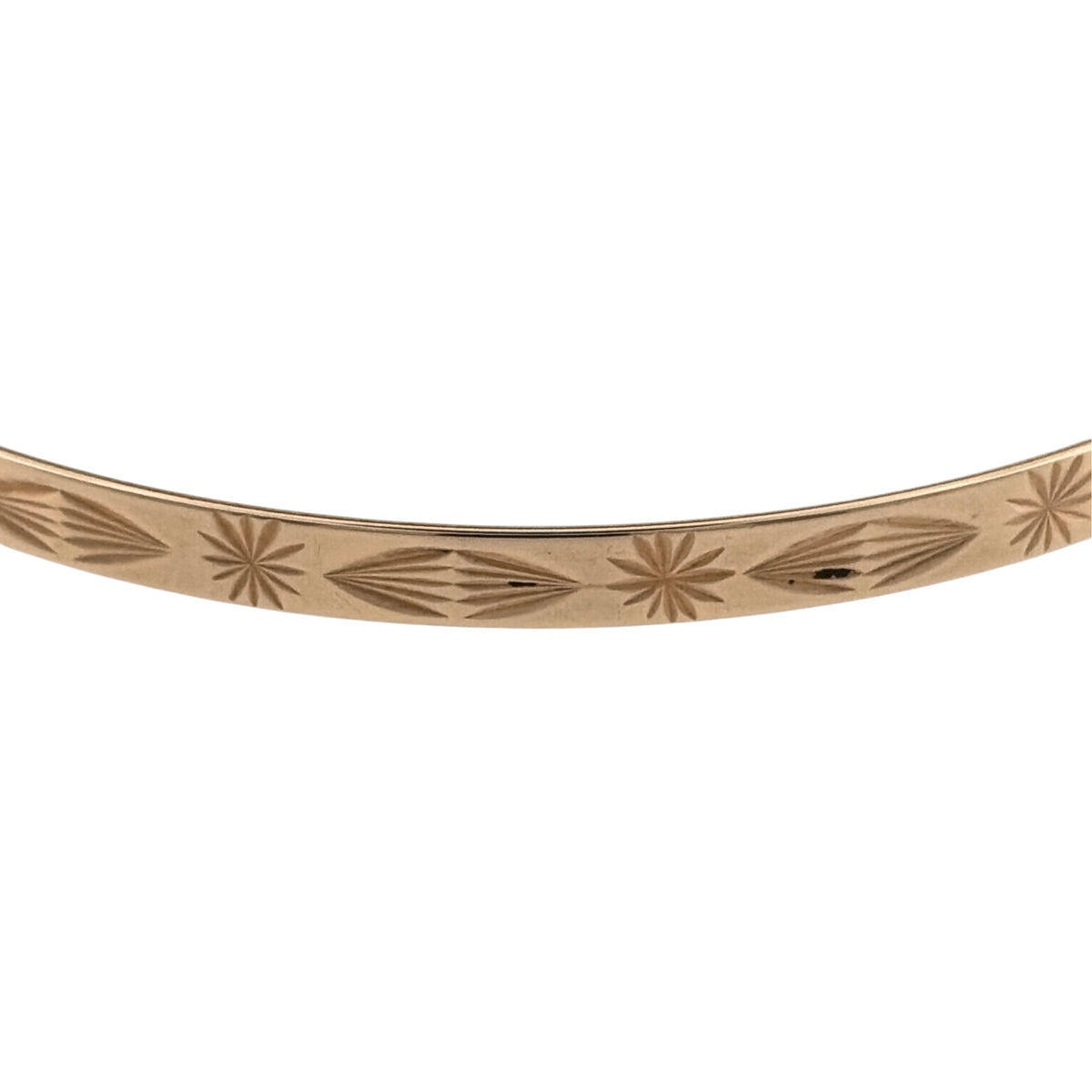 Add a timeless piece to your jewellery collection with this pre-owned 9ct yellow solid gold patterned bangle, featuring decorative detailing and a classic gold finish.

Design: The bangle features a traditional circular design with patterned detailing, creating an attractive and elegant appearance.
Material: Made from solid 9ct yellow gold, offering a classic warm gold finish.
Bangle Detail: The bangle measures approximately 4mm wide, with decorative patterned detailing that adds character to the design.