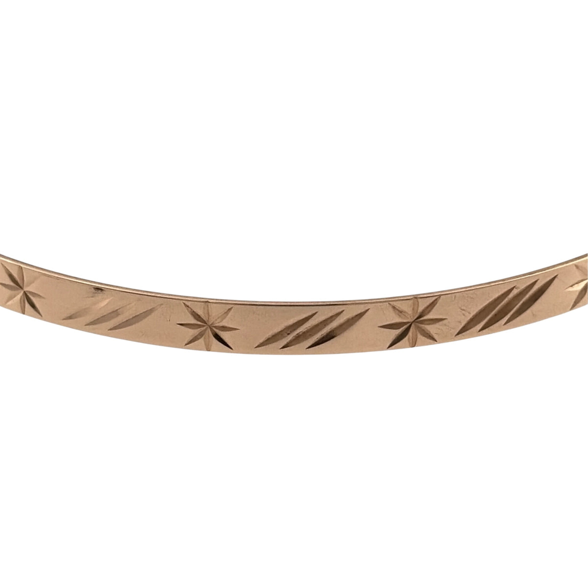 Add a timeless piece to your jewellery collection with this pre-owned 9ct yellow solid gold patterned bangle, featuring decorative detailing and a classic gold finish.

Design: The bangle features a traditional circular design with patterned detailing, creating an attractive and elegant appearance.
Material: Made from solid 9ct yellow gold, offering a classic warm gold finish.
Bangle Detail: The bangle measures approximately 4mm wide, with decorative patterned detailing that adds character to the design.