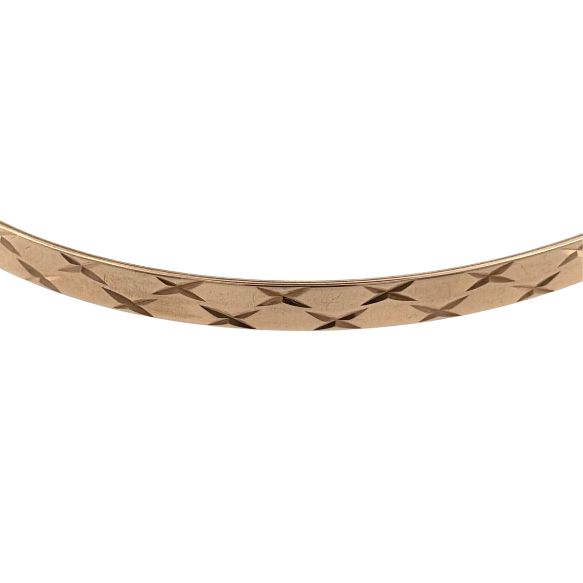 Add a timeless piece to your jewellery collection with this pre-owned 9ct yellow solid gold patterned bangle, featuring decorative detailing and a classic gold finish.

Design: The bangle features a traditional circular design with patterned detailing, creating an attractive and elegant appearance.
Material: Made from solid 9ct yellow gold, offering a classic warm gold finish.
Bangle Detail: The bangle measures approximately 4mm wide, with decorative patterned detailing that adds character to the design.