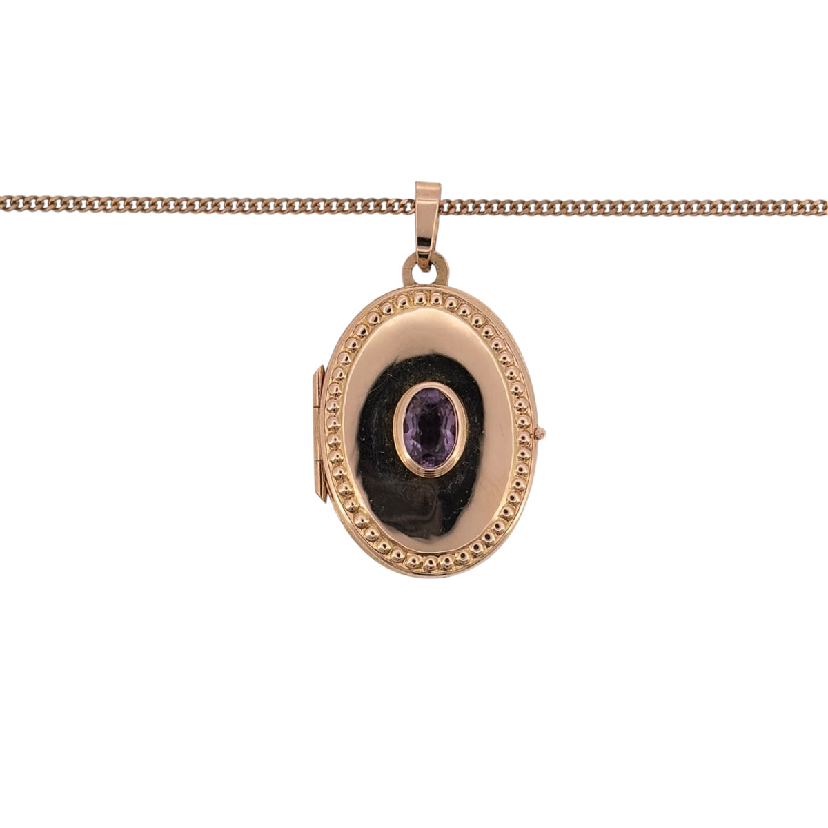 Add a sentimental touch to your jewellery collection with this pre-owned 9ct yellow gold and amethyst oval locket necklace, featuring a beautiful oval locket with an amethyst stone, suspended from an 18-inch curb chain.

Design: The necklace features a classic oval locket pendant with amethyst detailing, creating an elegant and timeless appearance.
Material: Made from 9ct yellow gold, offering a traditional warm gold finish that complements the purple tones of the amethyst.