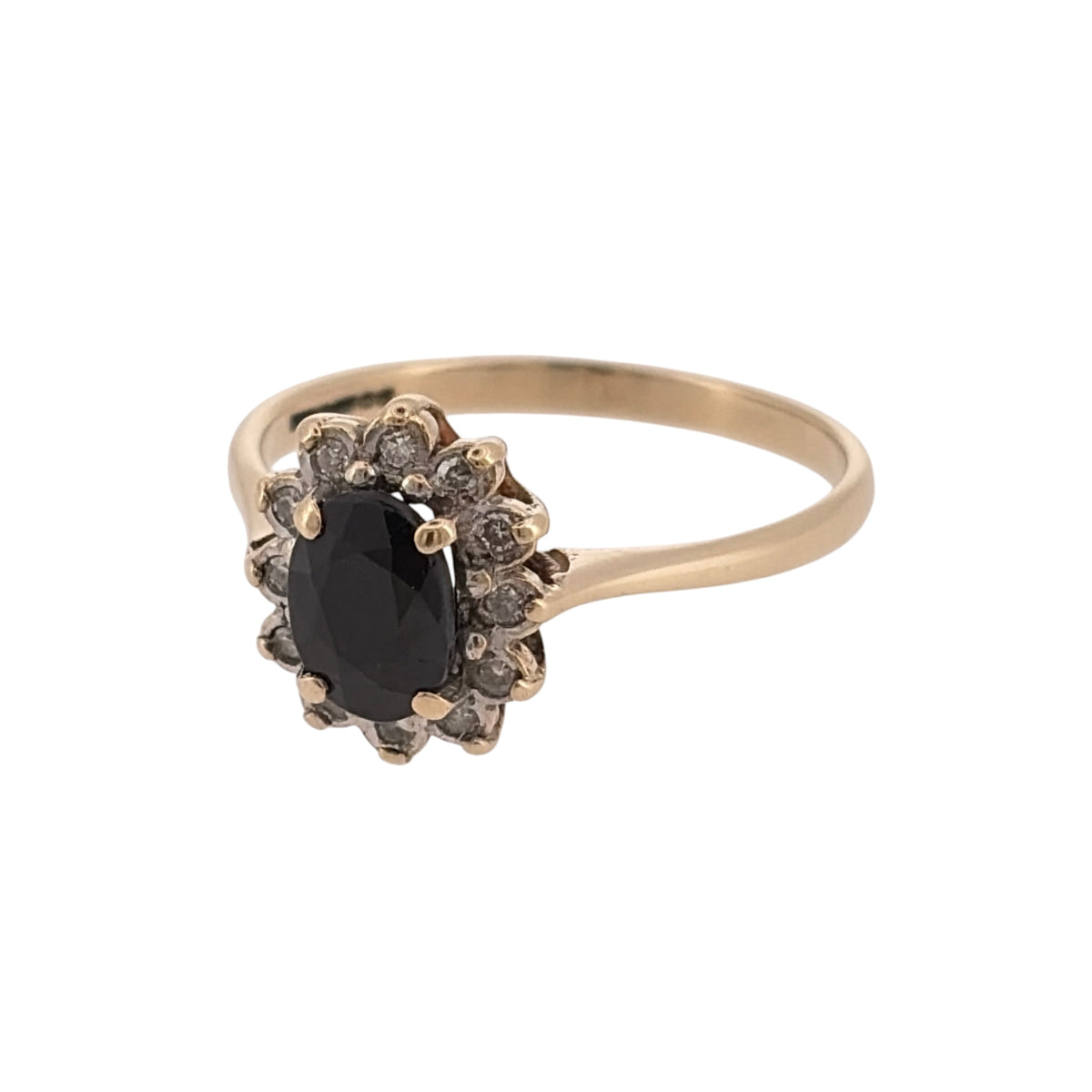 Add a classic touch of colour to your jewellery collection with this pre-owned 9ct yellow gold diamond and sapphire cluster ring, featuring a beautiful oval sapphire surrounded by diamonds.

Design: The ring features a traditional cluster design, with a central oval sapphire surrounded by diamonds, creating an elegant and timeless appearance.
Material: Made from 9ct yellow gold, offering a warm gold finish that complements the blue tones of the sapphire.