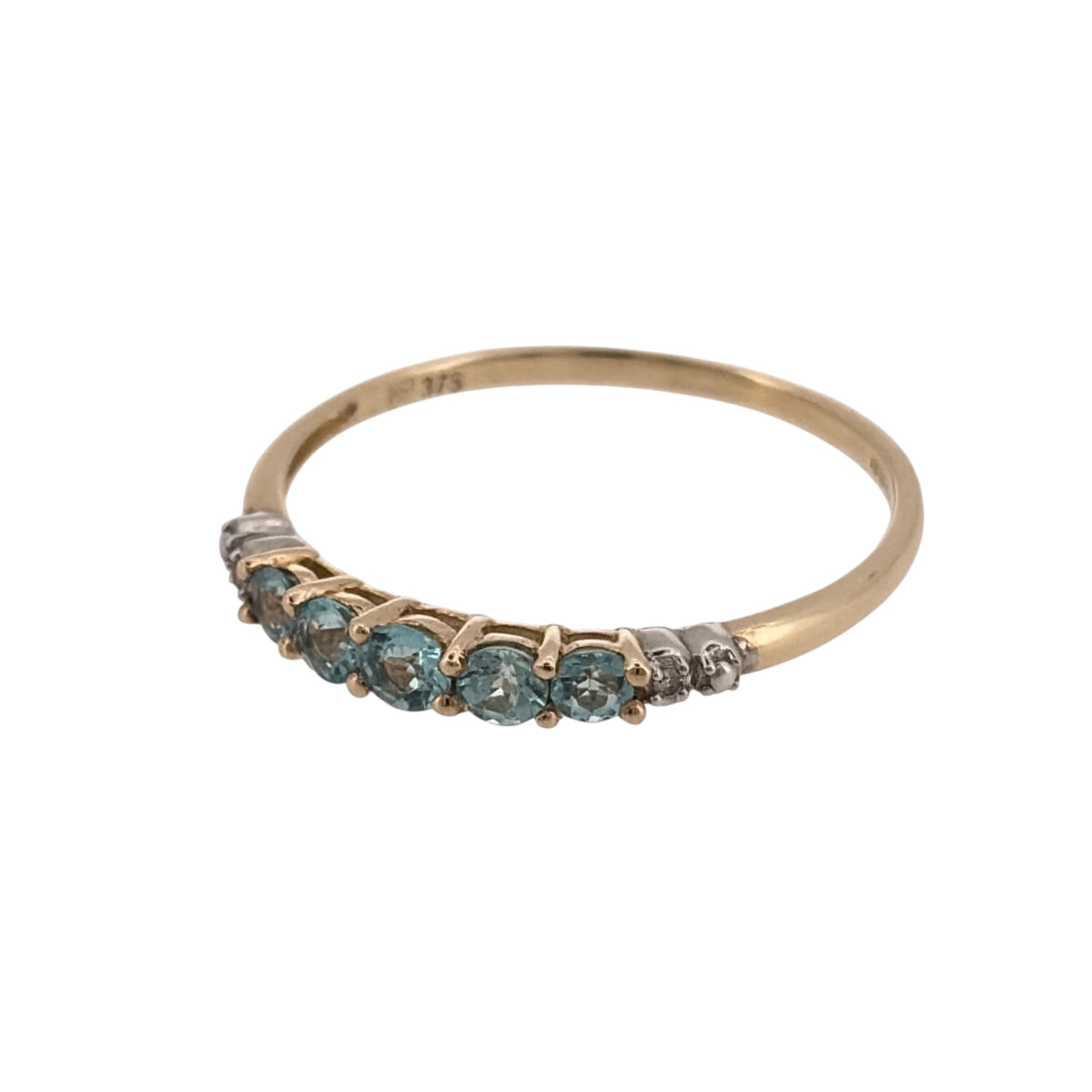 Add a colourful touch to your jewellery collection with this pre-owned 9ct yellow gold diamond and blue stone band ring, featuring five blue stones complemented by diamond detailing.

Design: The ring features a classic band design with five blue stones and decorative diamond detailing, creating an elegant and attractive appearance.
Material: Made from 9ct yellow gold, offering a traditional warm gold finish that complements the blue tones of the stones.