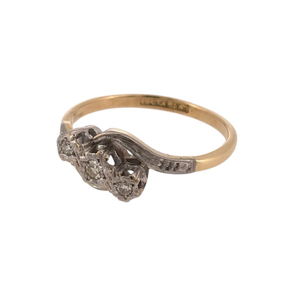 Add a timeless piece to your jewellery collection with this pre-owned 18ct yellow gold and platinum diamond trilogy twist ring, featuring three diamonds complemented by an elegant twisted design.

Design: The ring features a classic trilogy design with three diamonds and decorative twisted detailing, creating an attractive and elegant appearance.
Material: Made from 18ct yellow gold and platinum, combining the warm tones of yellow gold with the contrasting finish of platinum.