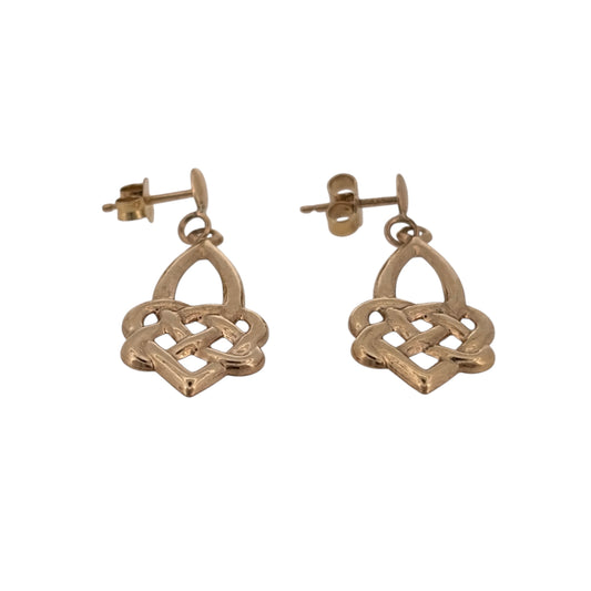 Add a traditional touch to your jewellery collection with these pre-owned 9ct yellow gold Celtic knot drop earrings, featuring a decorative knot design inspired by Celtic heritage.

Design: The earrings feature an elegant drop style with Celtic knot detailing, creating an attractive and meaningful appearance.
Material: Made from 9ct yellow gold, offering a classic warm gold finish.