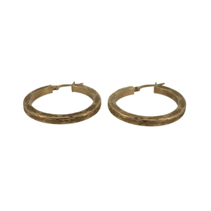 Add a classic touch to your jewellery collection with these pre-owned 9ct yellow gold patterned hoop creole earrings, featuring decorative detailing and a timeless gold finish.

Design: The earrings feature a traditional round creole hoop design with patterned detailing, creating an attractive and elegant appearance.
Material: Made from 9ct yellow gold, offering a classic warm gold finish.