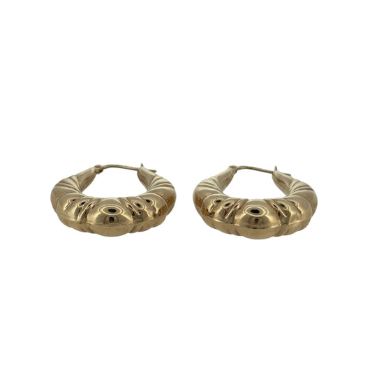 Add a decorative touch to your jewellery collection with these pre-owned 9ct yellow gold bubble patterned creole earrings, featuring a distinctive textured design and a classic gold finish.

Design: The earrings feature a traditional creole hoop style with decorative bubble-patterned detailing, creating an attractive and distinctive appearance.
Material: Made from 9ct yellow gold, offering a classic warm gold finish.