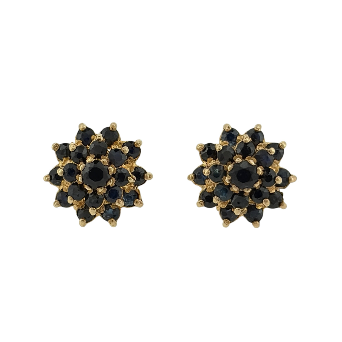 Add a classic touch of colour to your jewellery collection with these pre-owned 9ct yellow gold and sapphire cluster stud earrings, featuring beautiful sapphire stones arranged in a decorative cluster design.

Design: The earrings feature a traditional round cluster design, with sapphire stones creating an attractive and elegant appearance.
Material: Made from 9ct yellow gold, offering a warm gold finish that complements the rich blue tones of the sapphires.