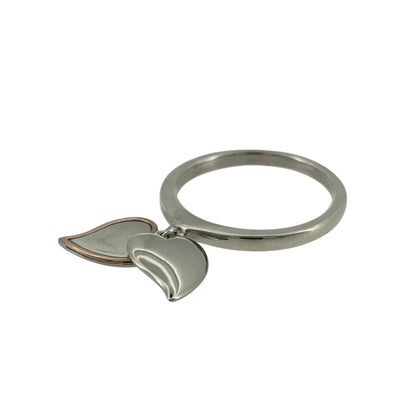 Add a sentimental touch to your jewellery collection with this pre-owned Clogau heart drop band ring, combining 925 sterling silver with 9ct rose gold detailing in a delicate and elegant design.

Design: The ring features a classic band style with a decorative heart drop detail, creating a charming and meaningful appearance.
Material: Made from 925 sterling silver with 9ct rose gold detailing, offering an attractive contrasting two-tone finish.