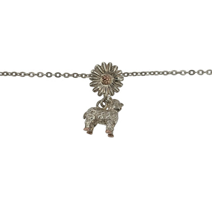 Add a charming touch to your jewellery collection with this pre-owned Clogau lamb daisy pendant necklace, combining 925 sterling silver with 9ct rose gold detailing in a delicate nature-inspired design.

Design: The necklace features a decorative lamb daisy pendant, creating an attractive and charming appearance inspired by nature.
Material: Made from 925 sterling silver with 9ct rose gold detailing, offering an elegant contrasting two-tone finish.