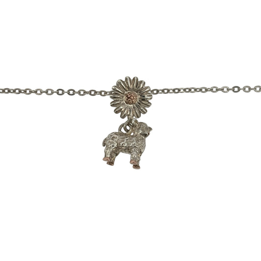 Add a charming touch to your jewellery collection with this pre-owned Clogau lamb daisy pendant necklace, combining 925 sterling silver with 9ct rose gold detailing in a delicate nature-inspired design.

Design: The necklace features a decorative lamb daisy pendant, creating an attractive and charming appearance inspired by nature.
Material: Made from 925 sterling silver with 9ct rose gold detailing, offering an elegant contrasting two-tone finish.