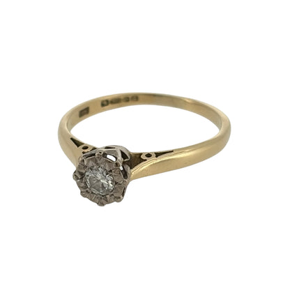 Add a timeless piece to your jewellery collection with this pre-owned 18ct yellow gold and diamond illusion set solitaire ring, featuring a beautiful brilliant cut diamond in a classic gold design.

Design: The ring features a traditional solitaire design with an illusion setting, designed to enhance the appearance of the central diamond.
Material: Made from 18ct yellow gold, offering a classic warm gold finish that complements the diamond.
