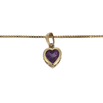 Add a romantic touch of colour to your jewellery collection with this pre-owned 9ct yellow gold and amethyst heart pendant necklace, featuring a beautiful heart-shaped amethyst suspended from a classic 16-inch box chain.

Design: The necklace features a charming heart-inspired pendant design, with a purple amethyst stone creating an elegant and sentimental appearance.
Material: Made from 9ct yellow gold, offering a traditional warm gold finish that beautifully complements the purple tones of the amethyst.
