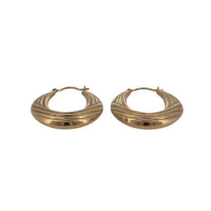 Add a classic touch to your jewellery collection with these pre-owned 9ct yellow gold textured oval creole earrings, featuring a decorative textured finish in a timeless gold design.

Design: The earrings feature an elegant oval creole design, with textured detailing creating an attractive and distinctive appearance.
Material: Made from 9ct yellow gold, offering a traditional warm gold finish that beautifully complements the decorative texture.