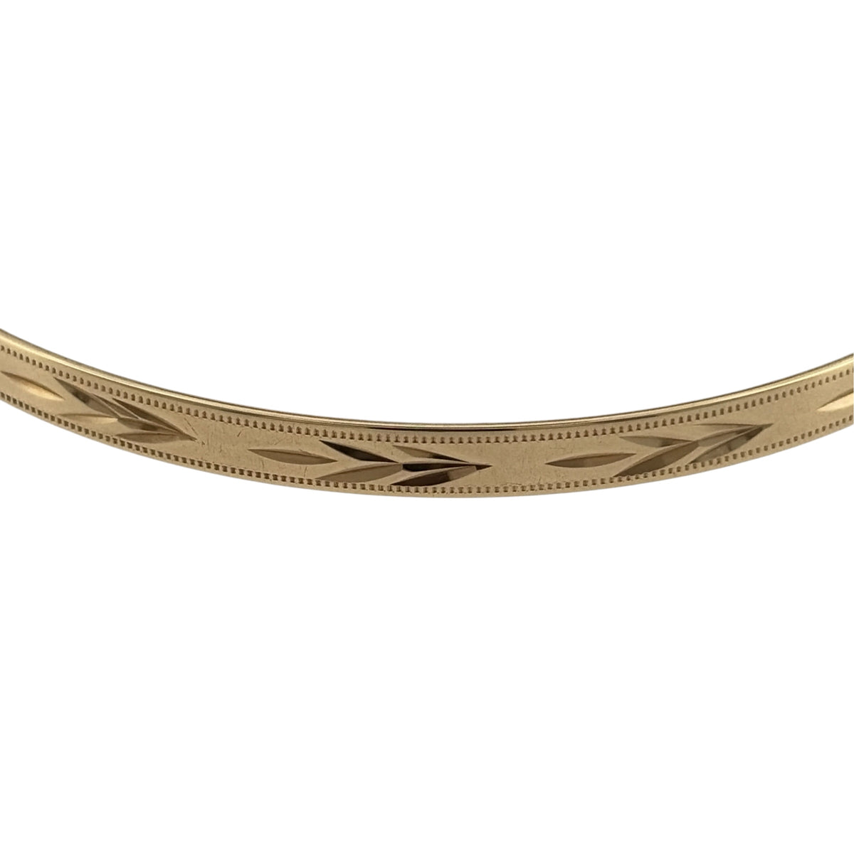 Add a timeless touch to your jewellery collection with this pre-owned 9ct solid yellow gold patterned milgrain edge bangle, featuring decorative detailing in a classic warm gold finish.

Design: The bangle features an elegant patterned design, with decorative detailing creating an attractive and distinctive appearance.
Material: Made from solid 9ct yellow gold, offering a traditional warm gold finish that beautifully complements the patterned design.