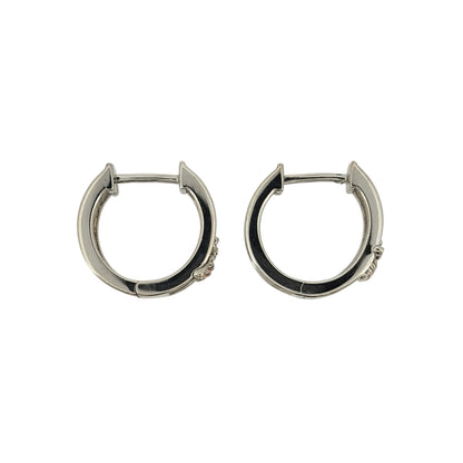 Add a charming touch to your jewellery collection with these pre-owned 925 sterling silver and 9ct rose gold Clogau Honeycomb Bee huggie hoop earrings, featuring a beautiful nature-inspired design in an elegant two-tone finish.

Design: The earrings feature Clogau's Honeycomb Bee design, incorporating delicate bee and honeycomb-inspired detailing for a distinctive and decorative appearance.