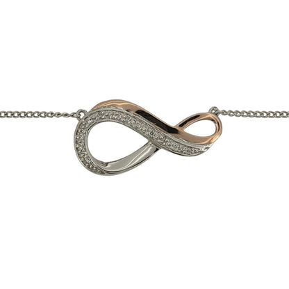Add a meaningful touch to your jewellery collection with this pre-owned 925 sterling silver, 9ct rose gold and white topaz Clogau Infinity necklace, featuring an elegant infinity design in a beautiful two-tone finish.

Design: The necklace features the classic infinity symbol, representing everlasting love and connection, with contrasting silver and rose gold detailing for a sentimental and timeless appearance.