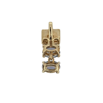 Add a beautiful touch of colour to your jewellery collection with this pre-owned 9ct yellow gold diamond and tanzanite pendant, featuring elegant oval tanzanite gemstones complemented by delicate diamond detailing.

Design: The pendant features a decorative gemstone design, combining the distinctive blue-violet tones of tanzanite with diamonds and warm yellow gold for an elegant appearance.